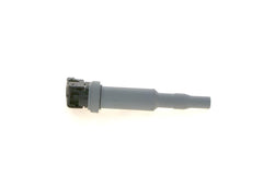 Bosch coil installed on spark plug demonstrating secure seating benefit