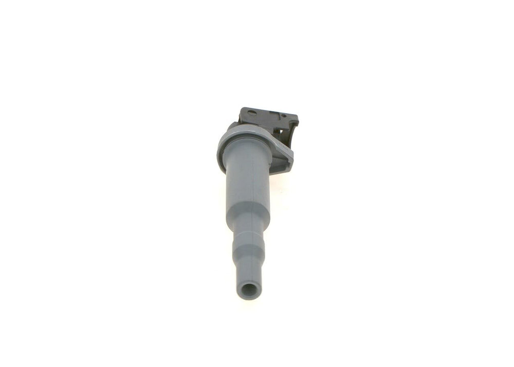 Bosch ignition coil in a workshop scene conveying reliable OEM-quality