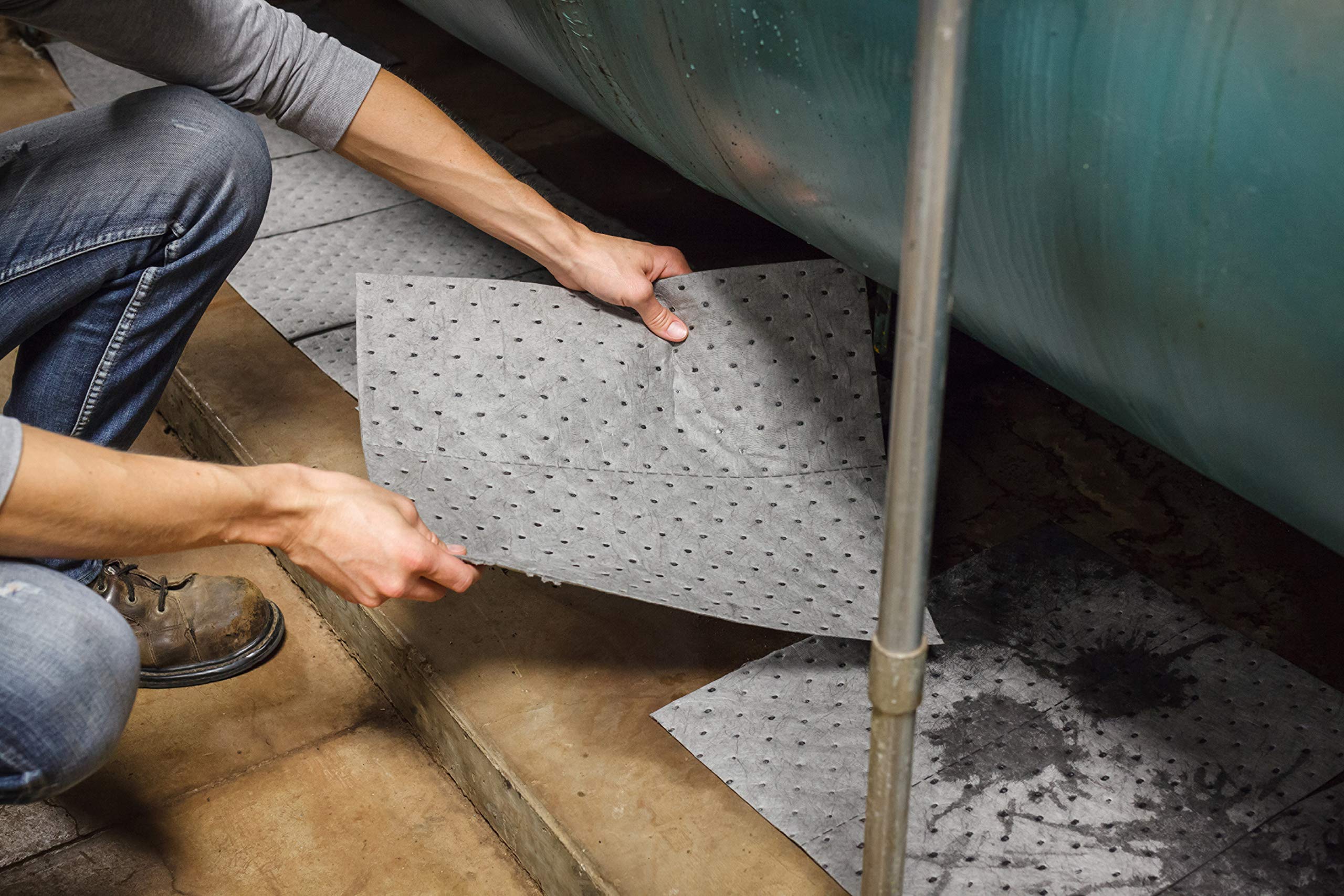 Brady MRO100 pad in use at workstation for fast spill control and clean surfaces