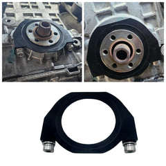 BZP guard installed in BMW engine bay protecting crank seal and belt from debris