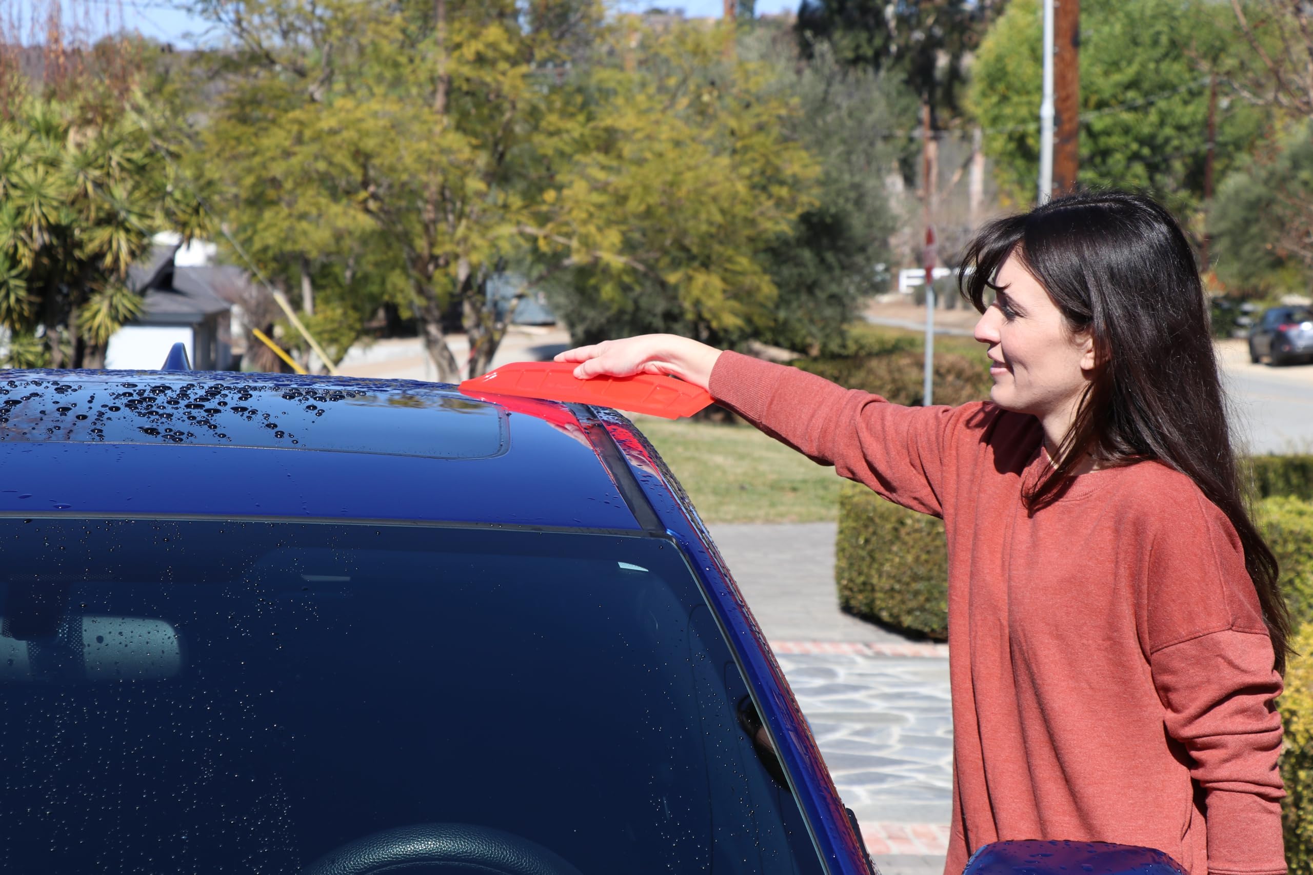 California Car Duster detailer end reaching recessed mirror areas