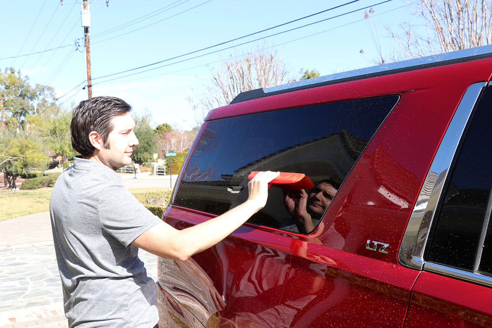 California Car Duster drying side mirror without scratching