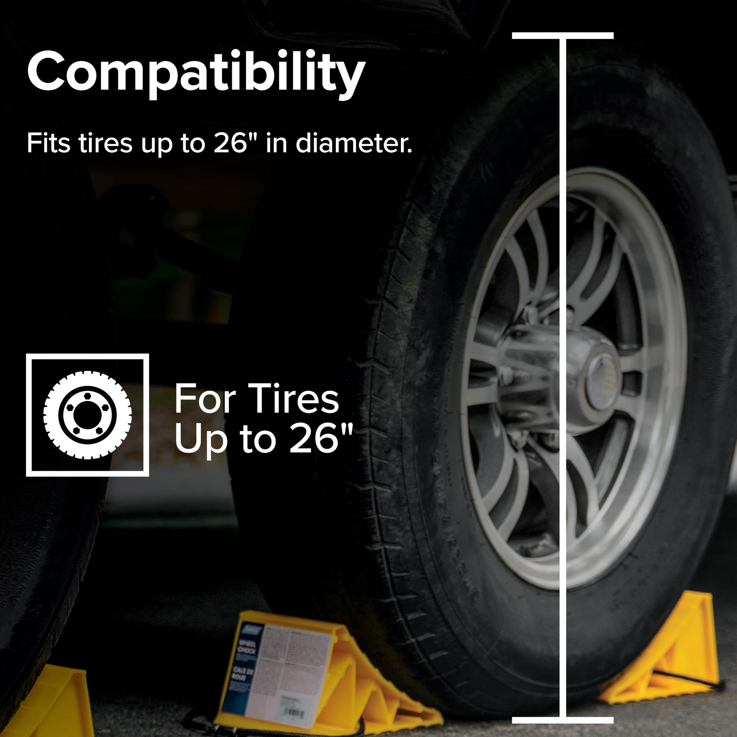 Camco next to ruler for size comparison showing compatibility with common tires