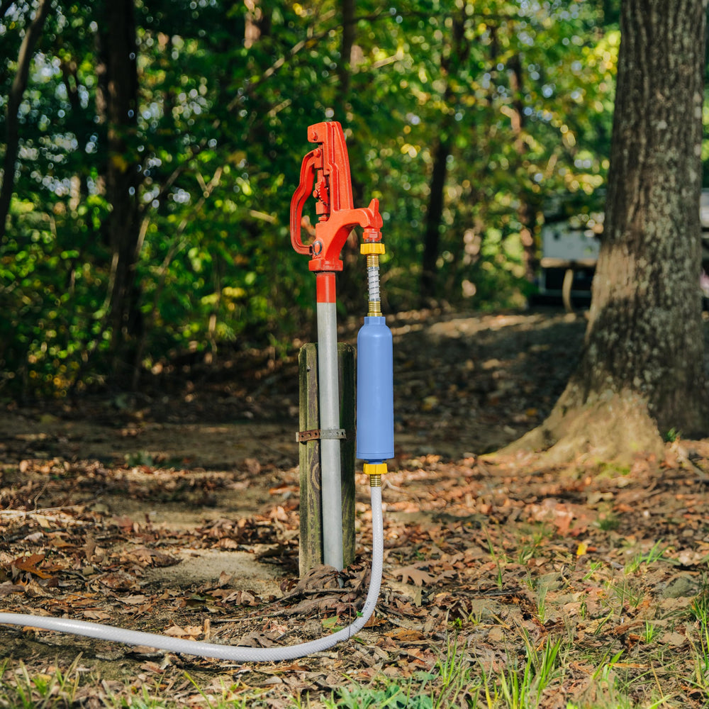 Camco TastePURE alongside tape measure showing 75-foot reach benefit