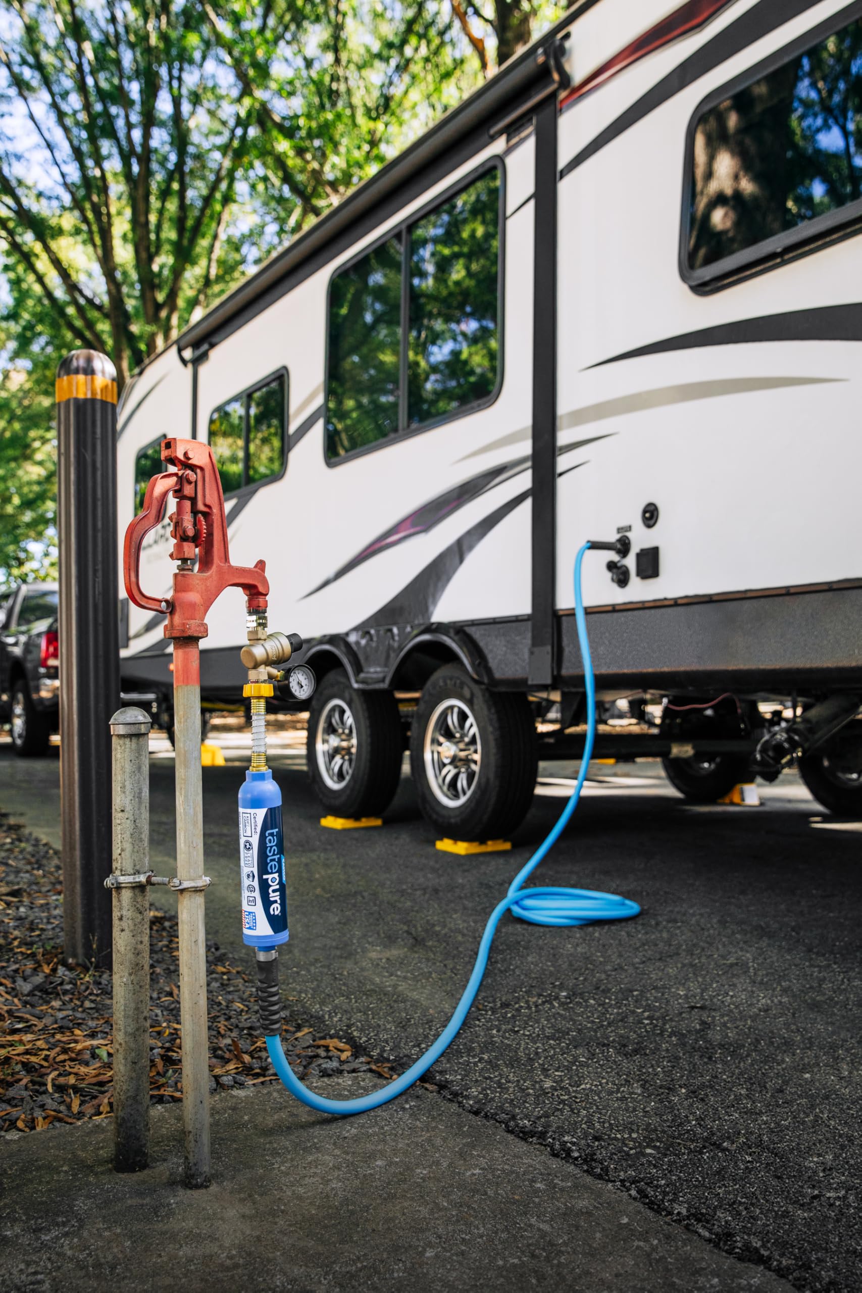 Camco filter in outdoor campsite setting showing clean drinking water convenience benefit