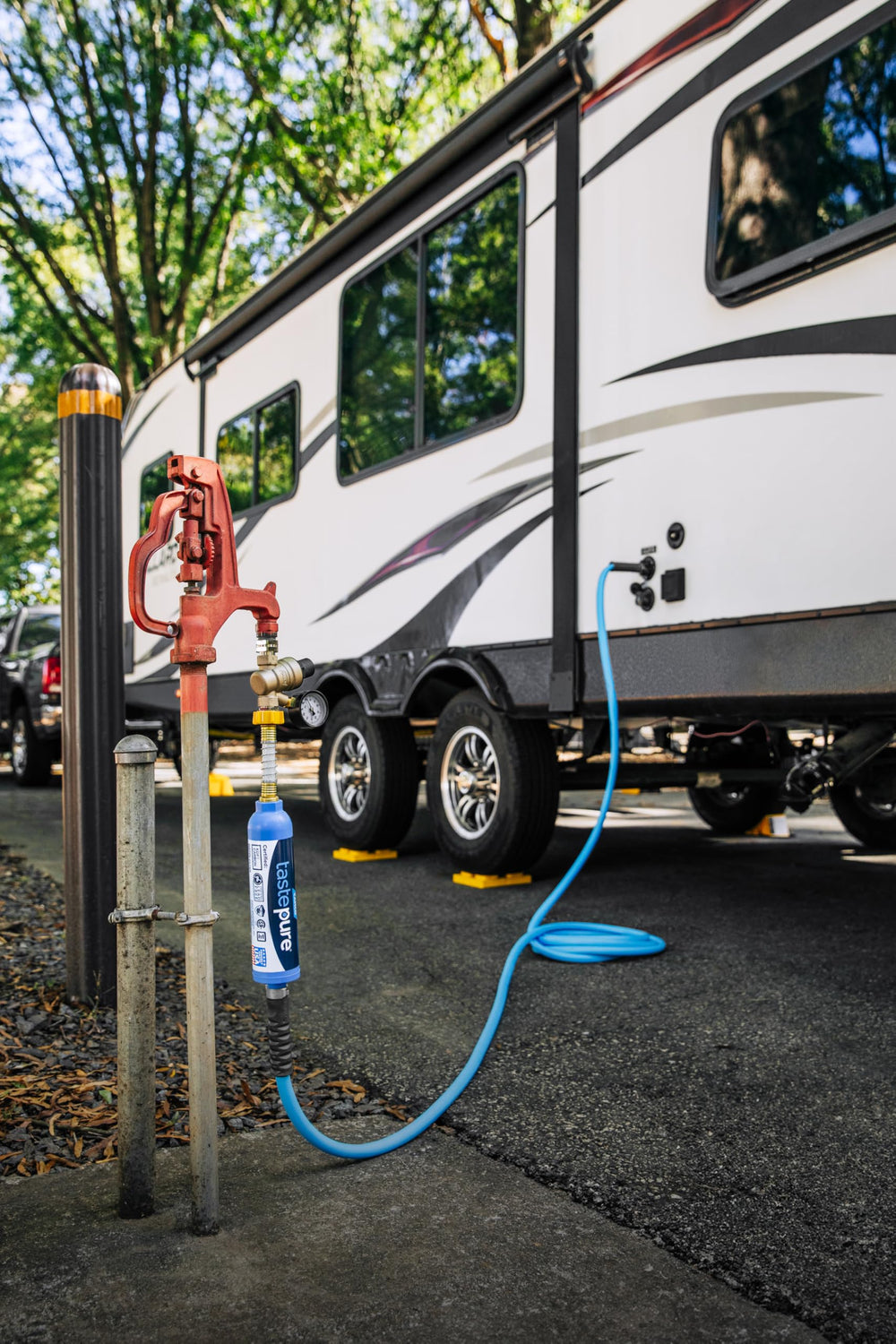Camco filter in outdoor campsite setting showing clean drinking water convenience benefit