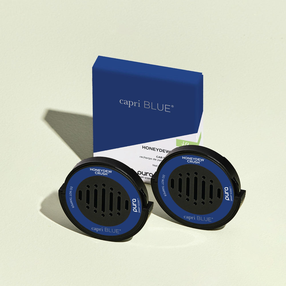 Capri Blue close-up of refill cartridge highlighting easy snap-in benefit