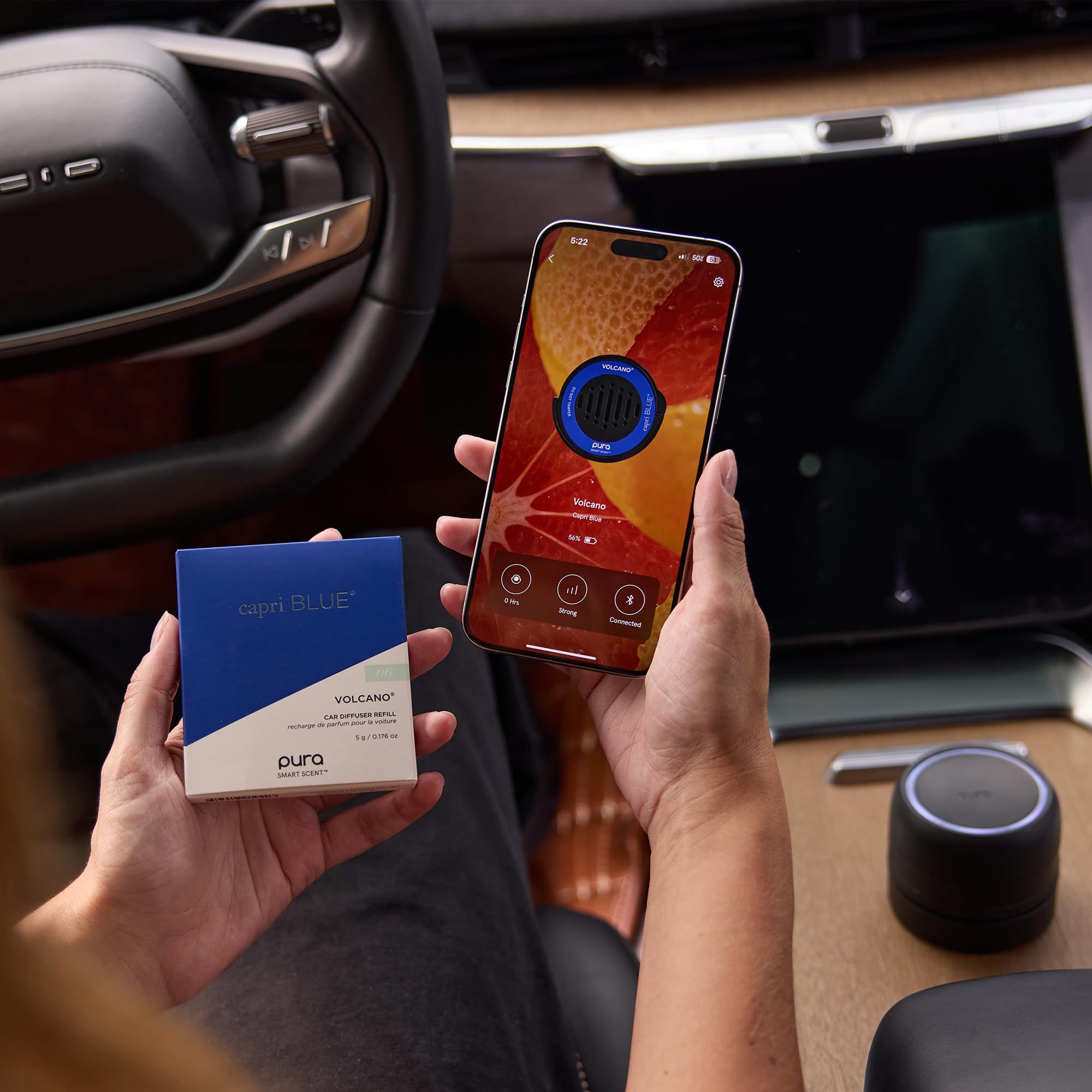 Capri Blue refill beside a smartphone for size comparison and convenient portability