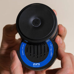 Refill liquid detail shot highlighting Capri Blue fragrance concentration for lasting scent