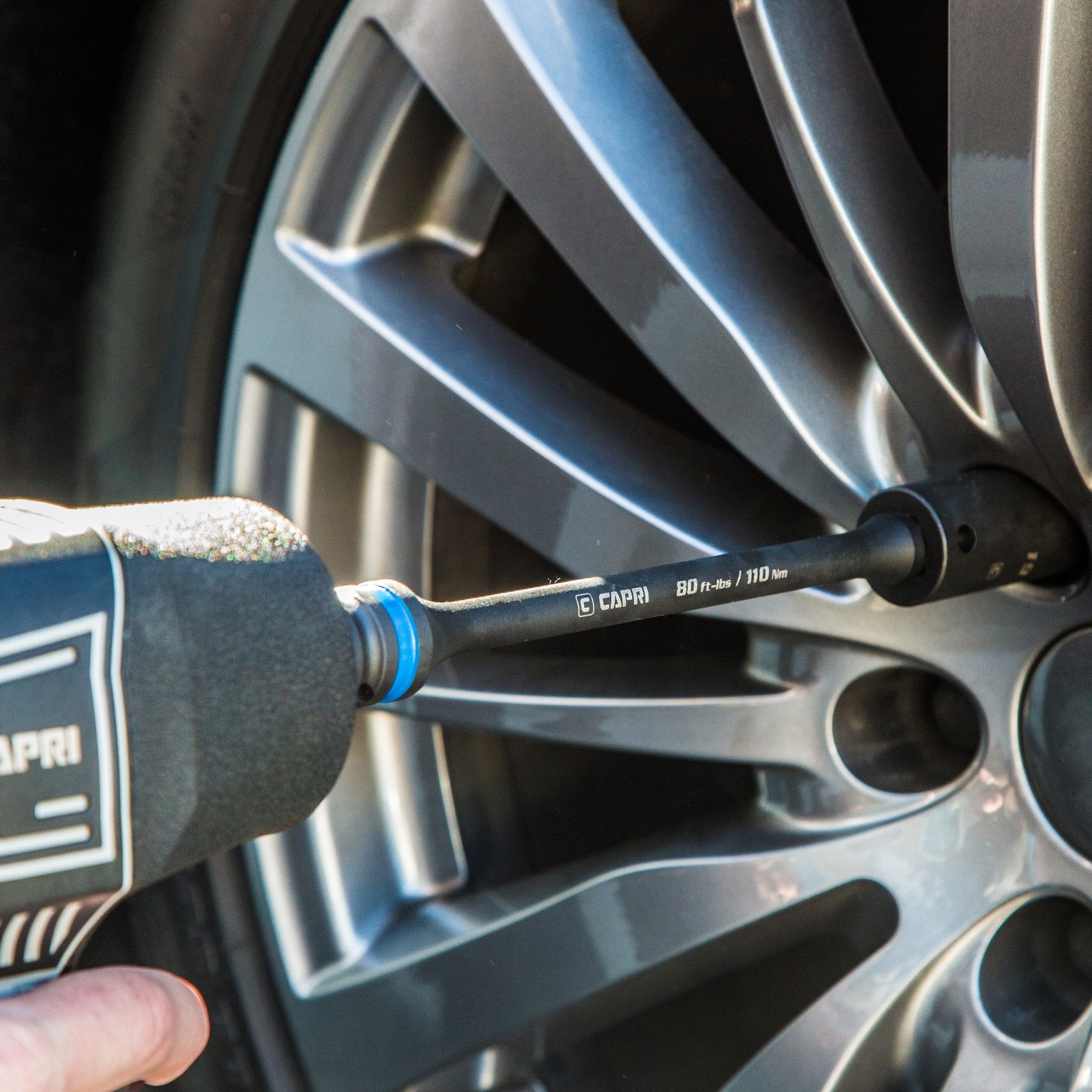 Capri Tools in use with impact wrench demonstrating controlled torque and safer fastening