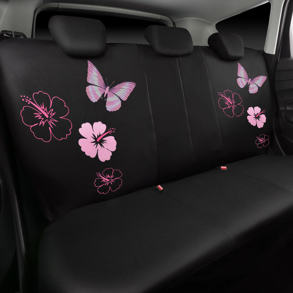 CAR PASS car interior styled in driveway showing cohesive black and pink aesthetic