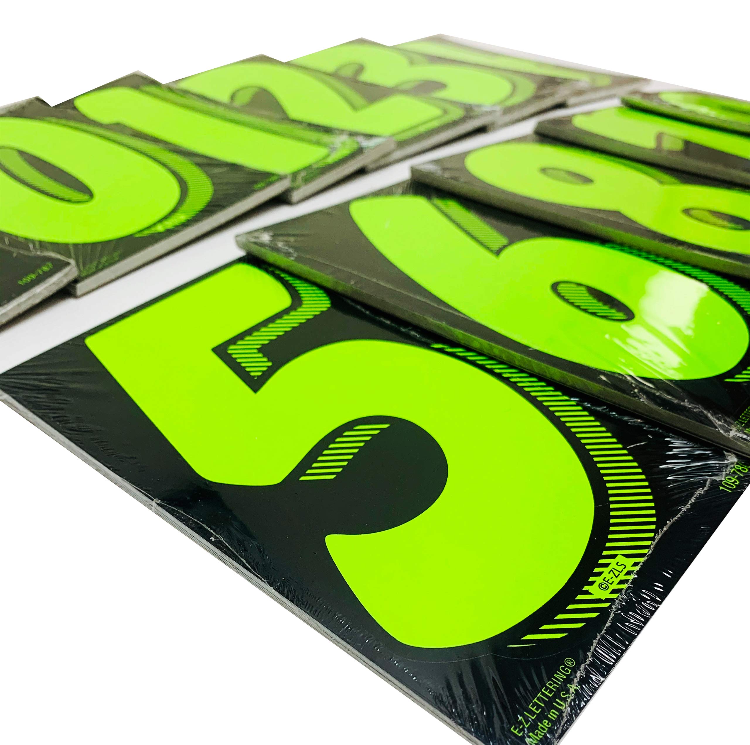 CarBowz lot display with multiple cars sporting chartreuse numbers for high impact