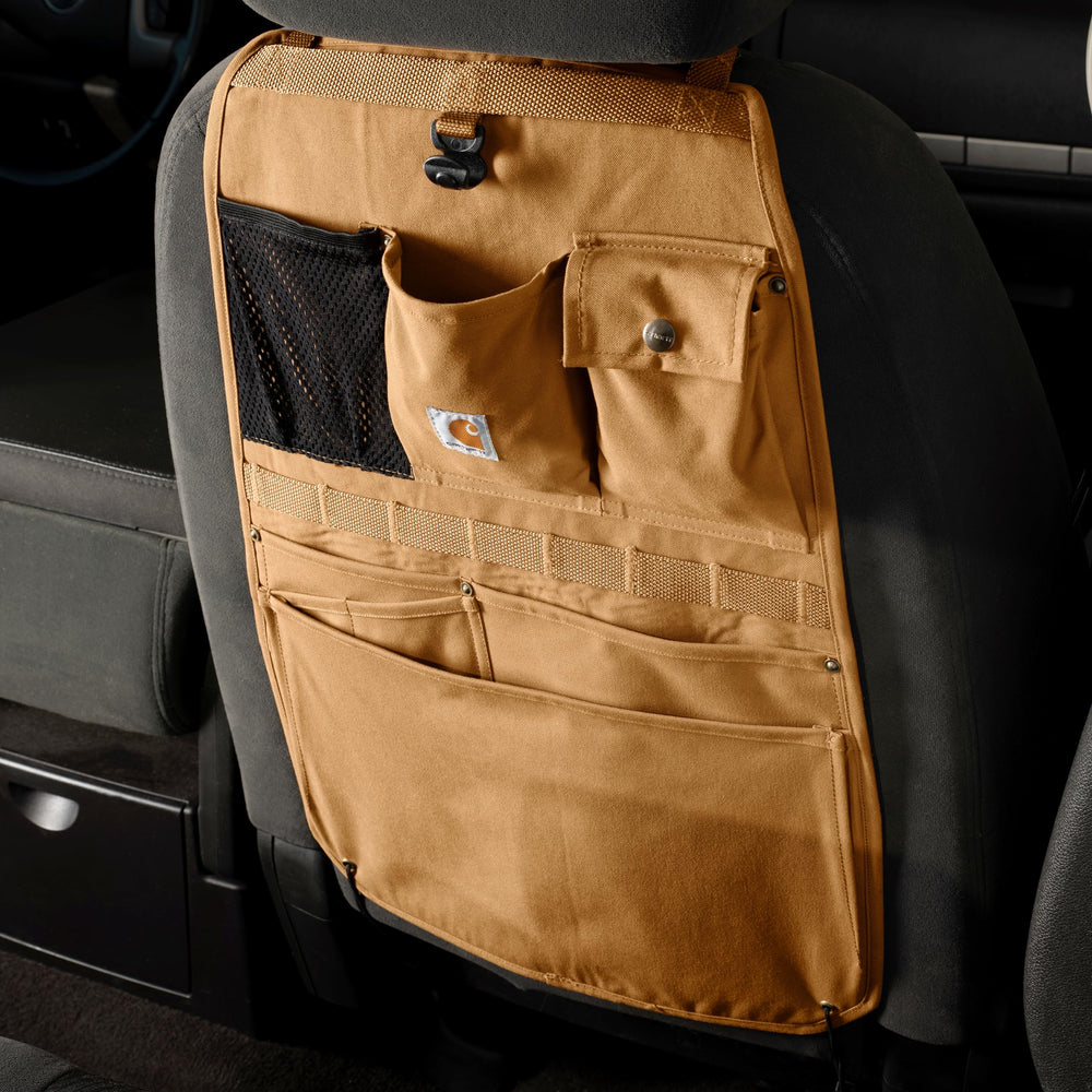 Carhartt fabric texture showing CORDURA and DWR repelling moisture