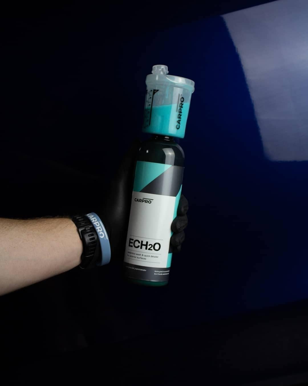 CARPRO ECH2O 500mL bottle next to ruler showing compact size and value