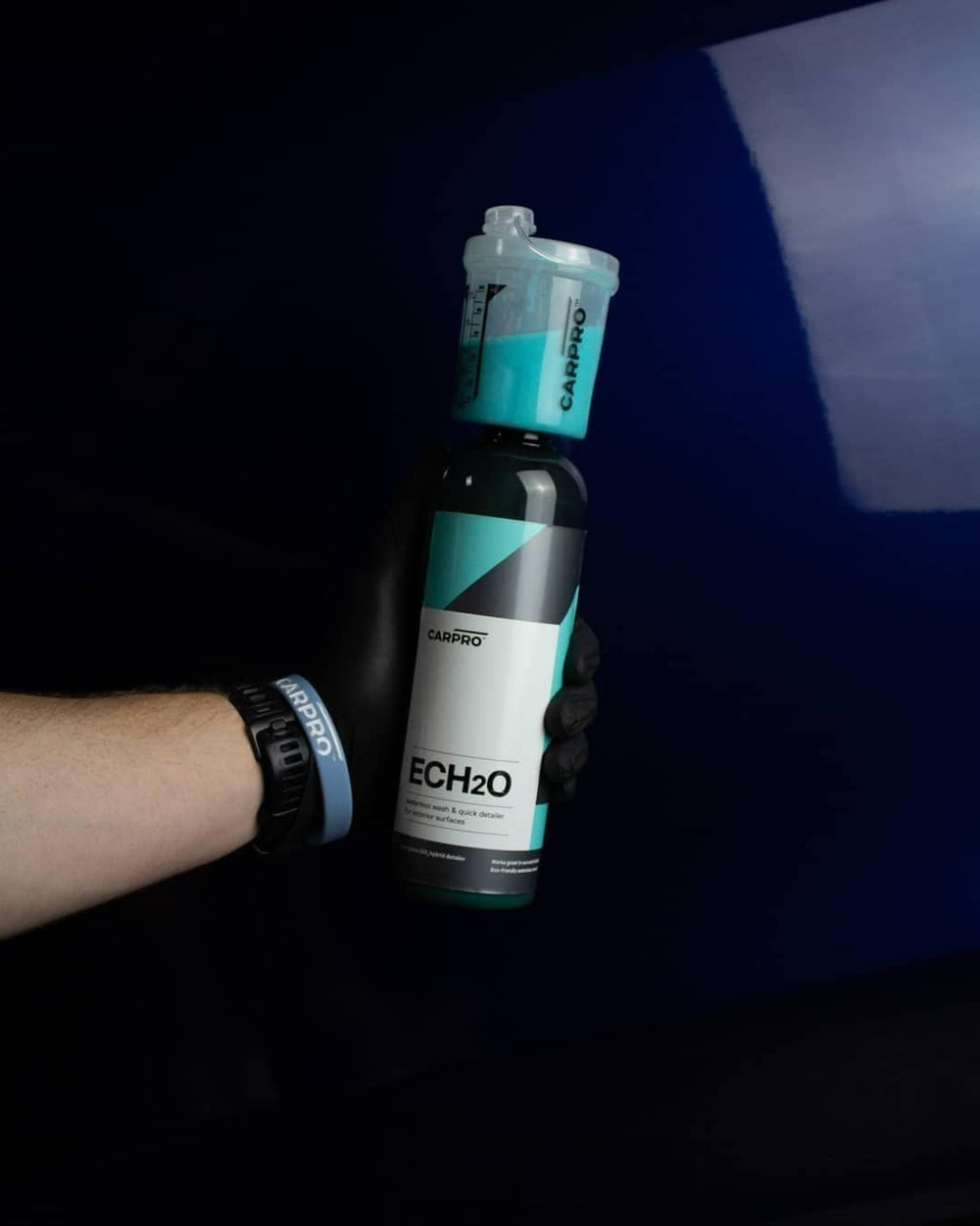 CARPRO ECH2O 500mL bottle next to ruler showing compact size and value