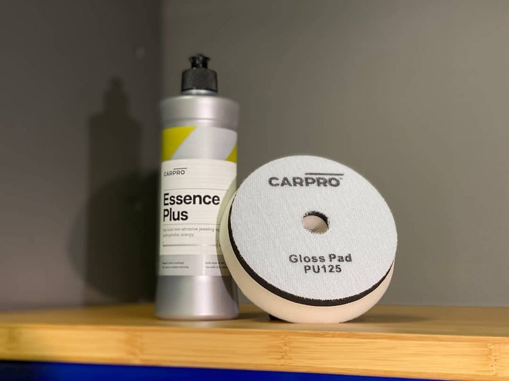 CARPRO Essence PLUS water beading demo on paint showing strong hydrophobic benefit