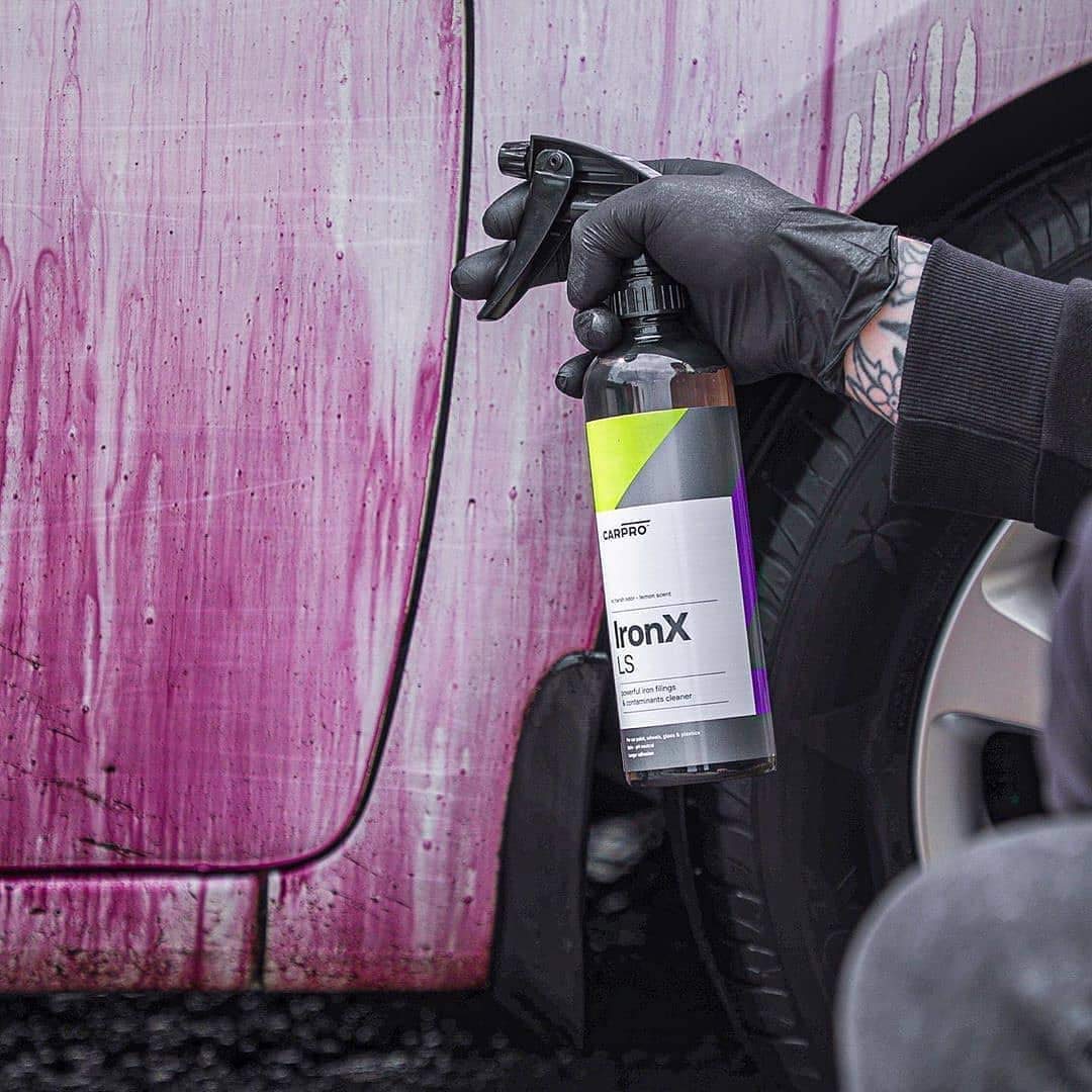 CARPRO reaction close-up showing dissolved iron particles and visible cleaning benefit