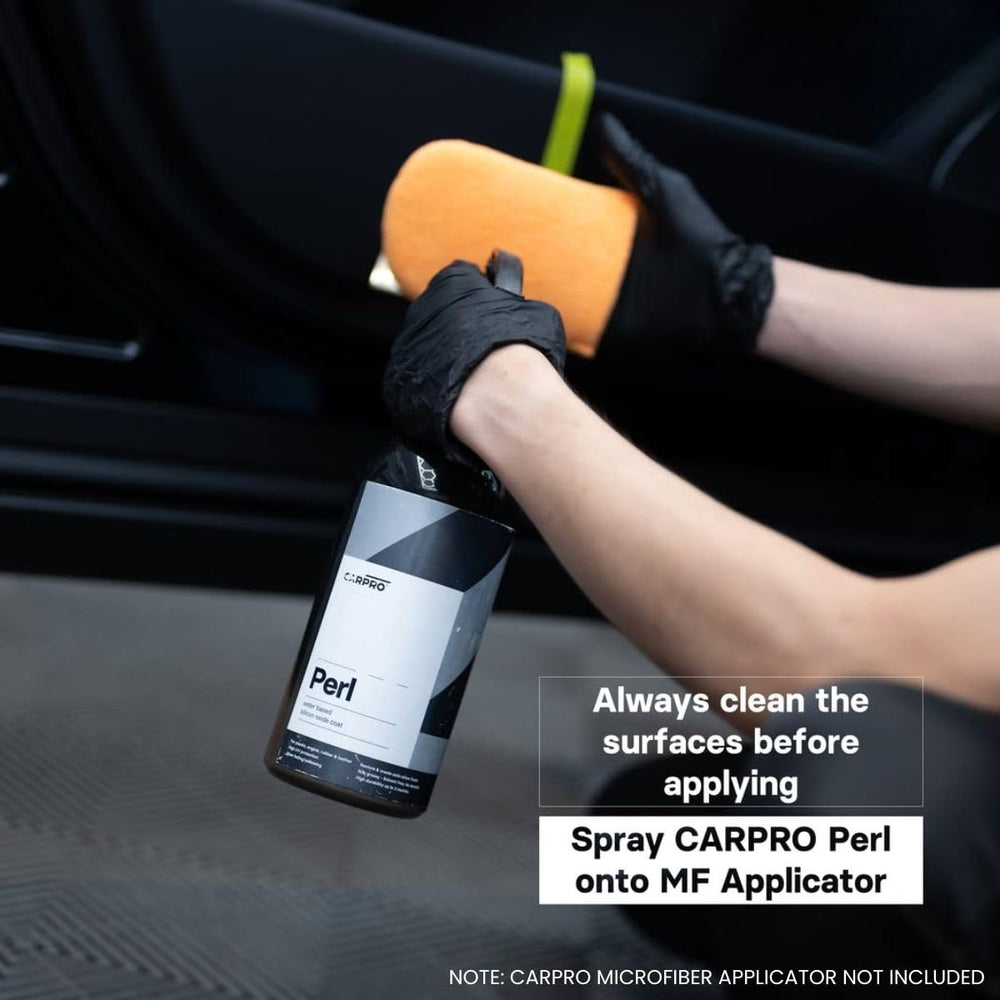 CARPRO PERL applied to dashboard restoring color and reducing shine