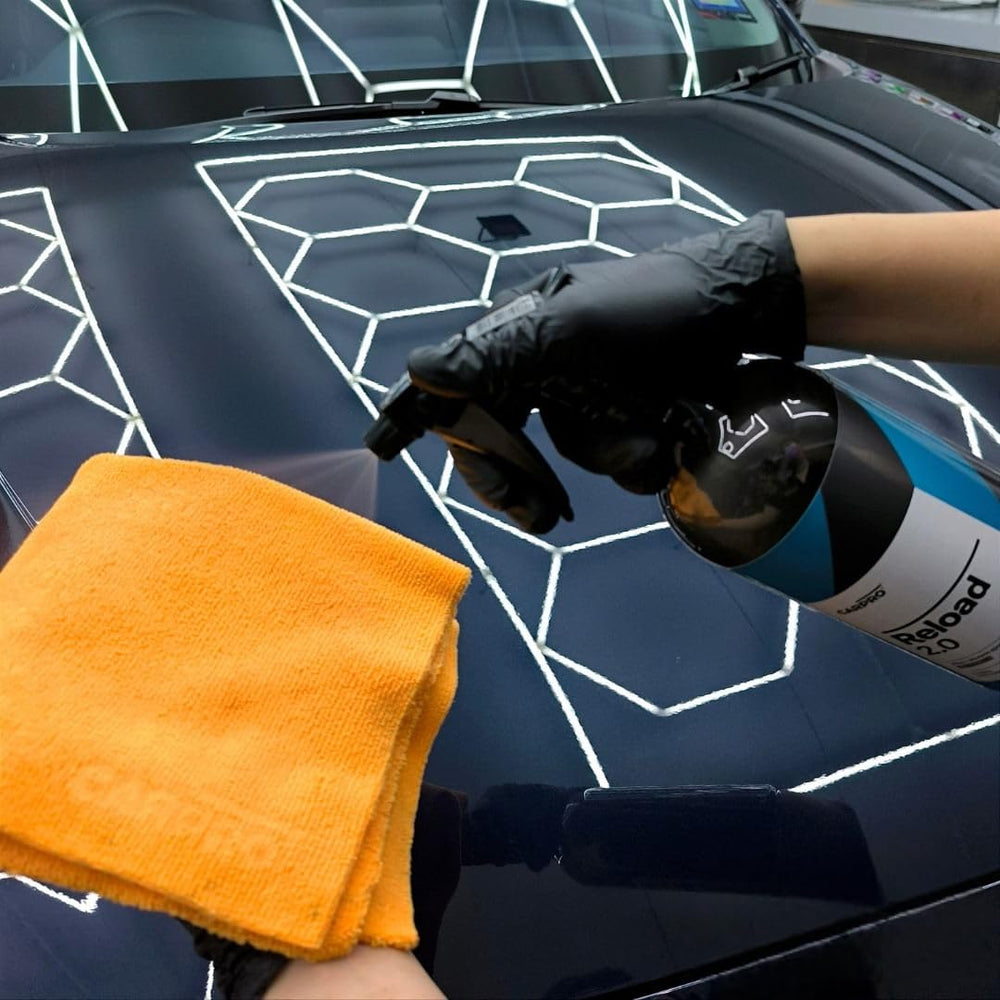 CARPRO applied to a wet panel showing compatibility and easy spread