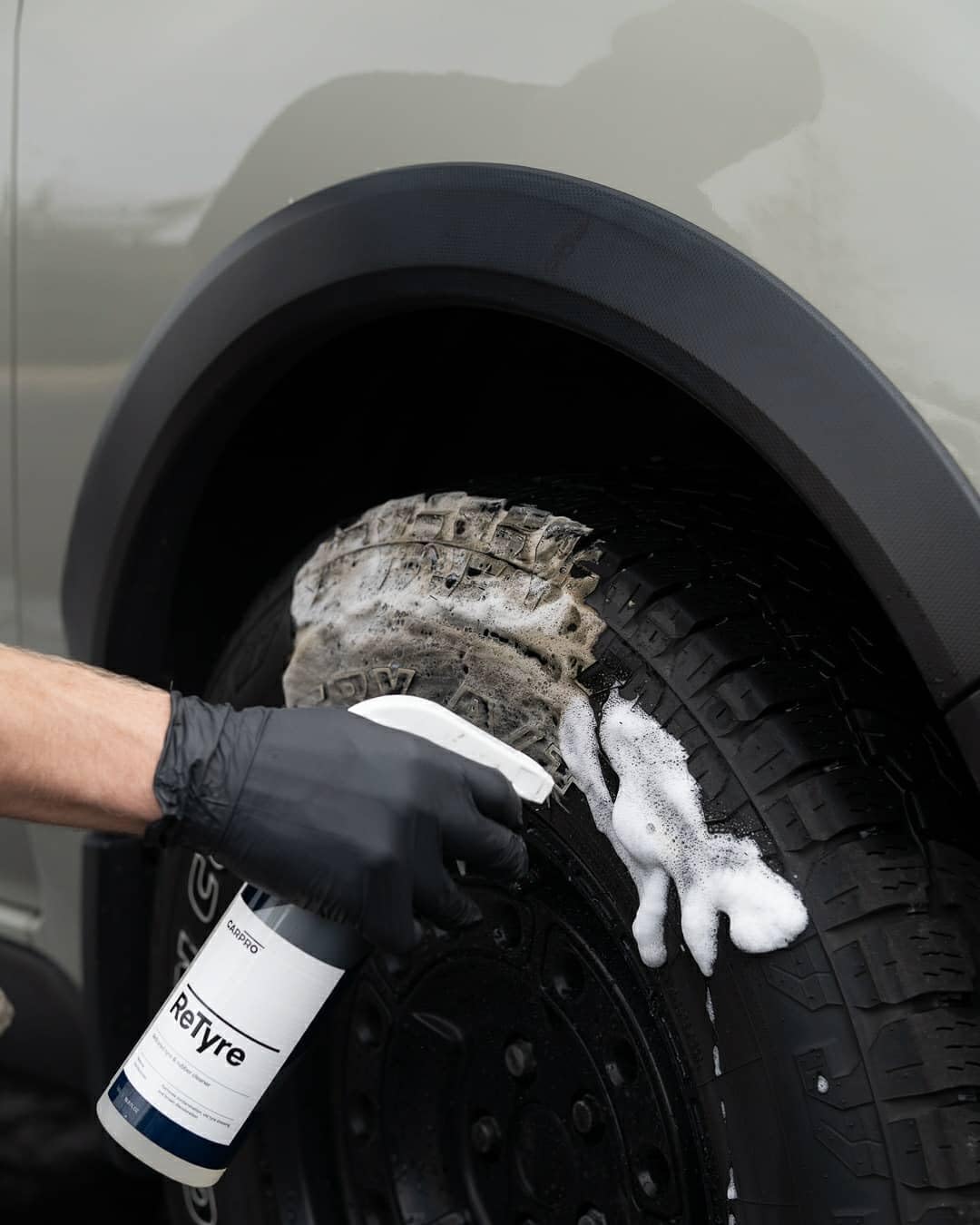CARPRO ReTyre thick foam close-up clinging to tire for deeper clean