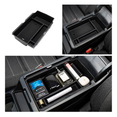 Carwiner secondary storage top view organizing cables and pens for clutter-free console