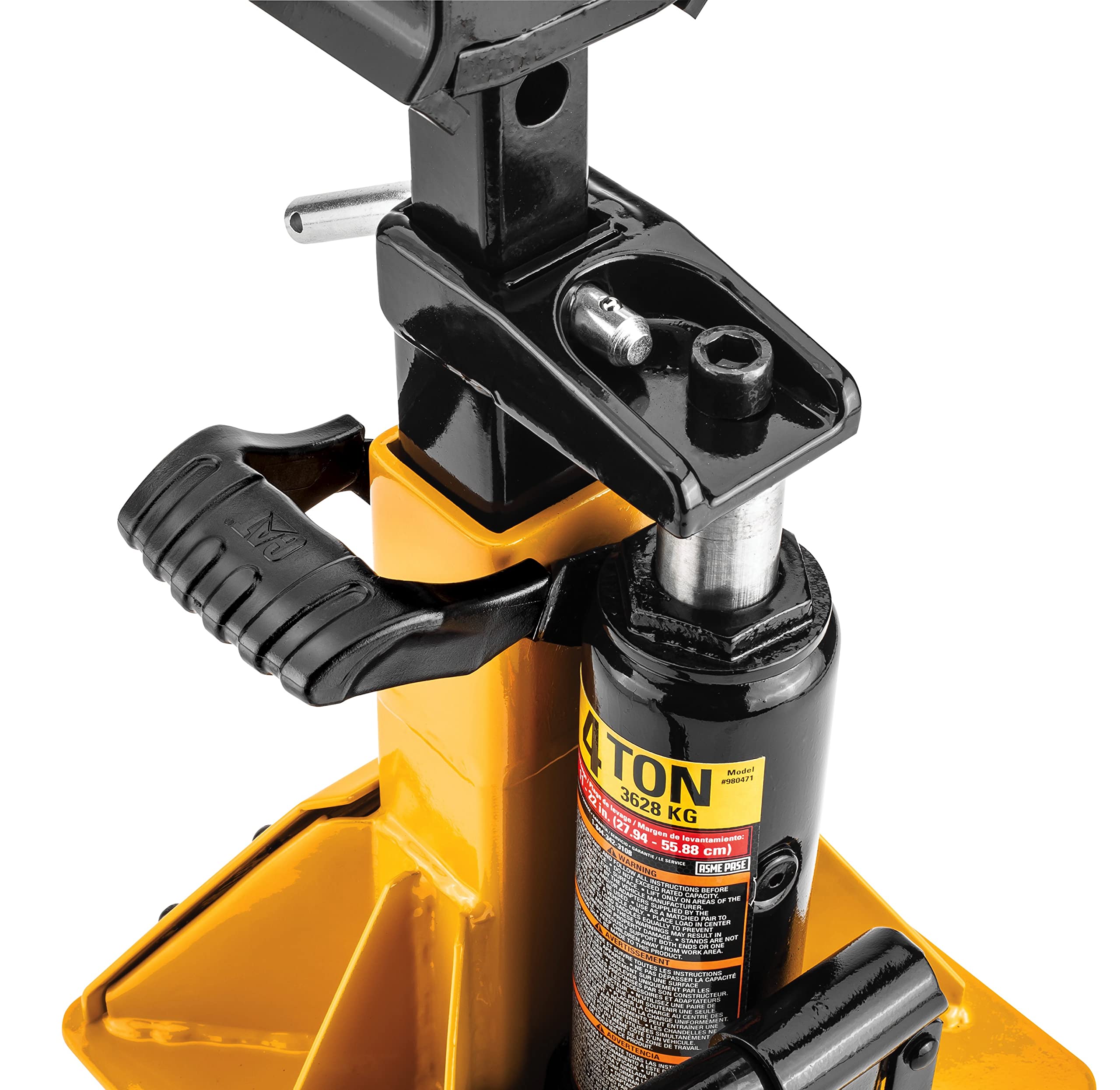 CAT jack next to a wrench for size scale and easy trunk storage convenience