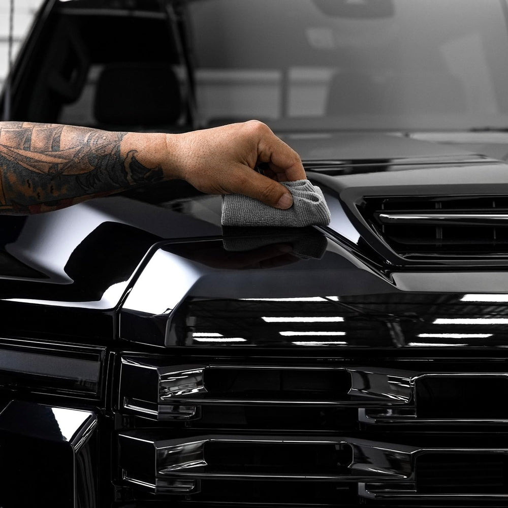 CERAKOTE-coated car parked in driveway showing real-world instant visual improvement