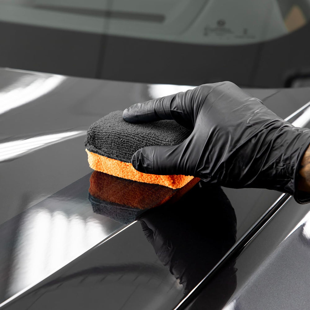 CERAKOTE water beading on car hood illustrating strong hydrophobic protection