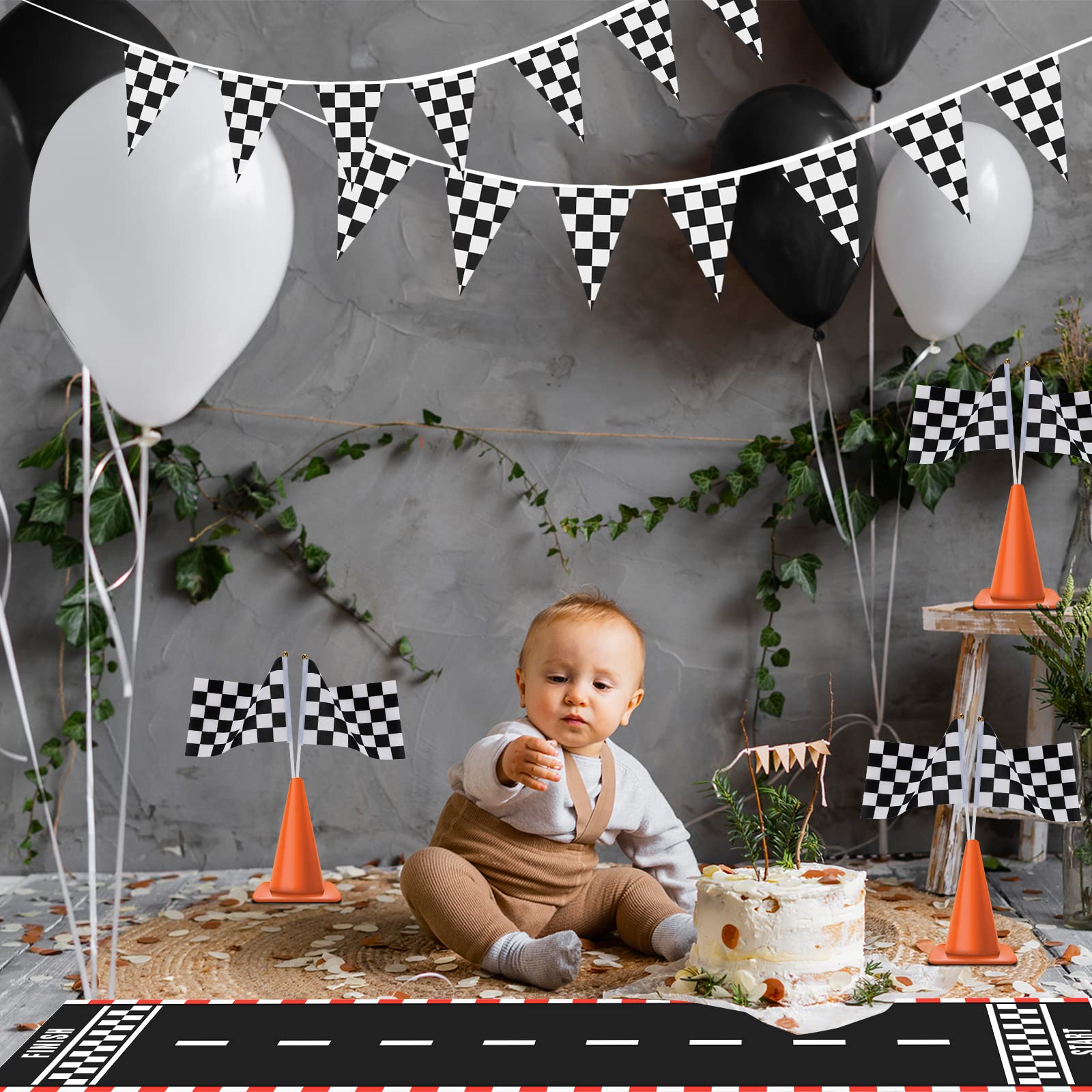 Chalyna racetrack repurposed as a table runner adding race-theme décor to party tables