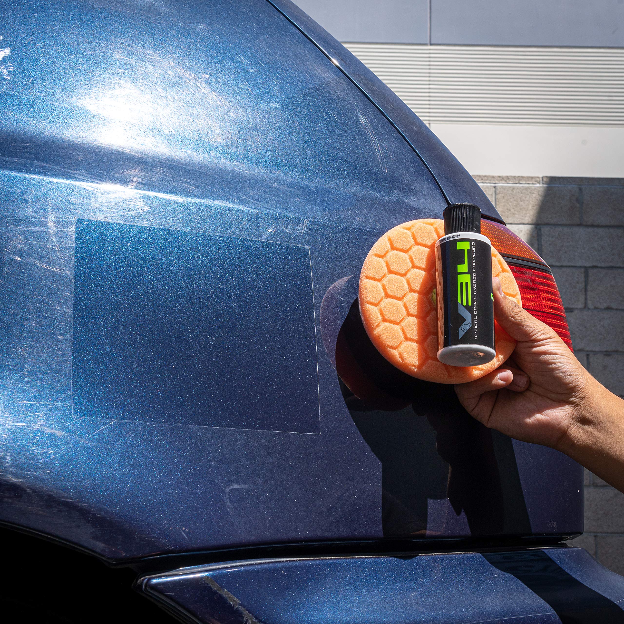 Chemical Guys V34 applied with polisher on car door demonstrating defect removal