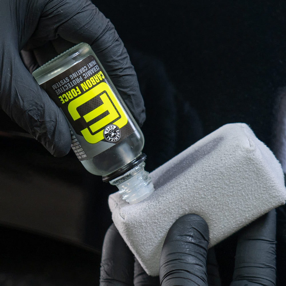 Chemical Guys applying coating on car panel for durable protection