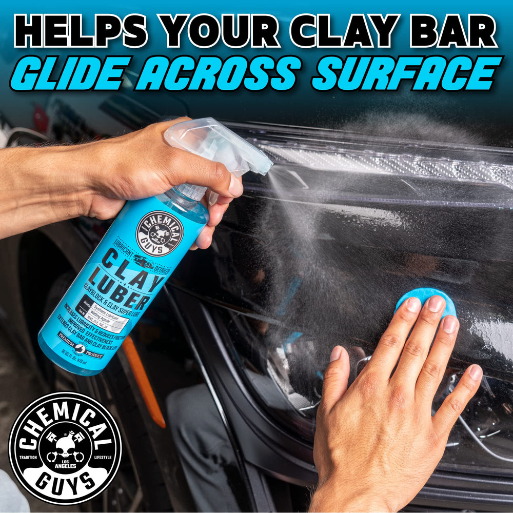 Chemical Guys clay bar beside hand for size and handling benefit
