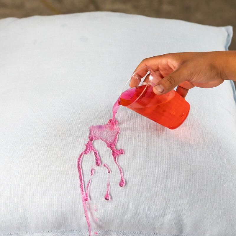 Chemical Guys bottle held to show 16 oz scale for coverage estimate
