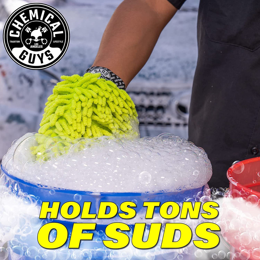 Chemical Guys TORQ Foam Blaster attached to hose creating thick foam