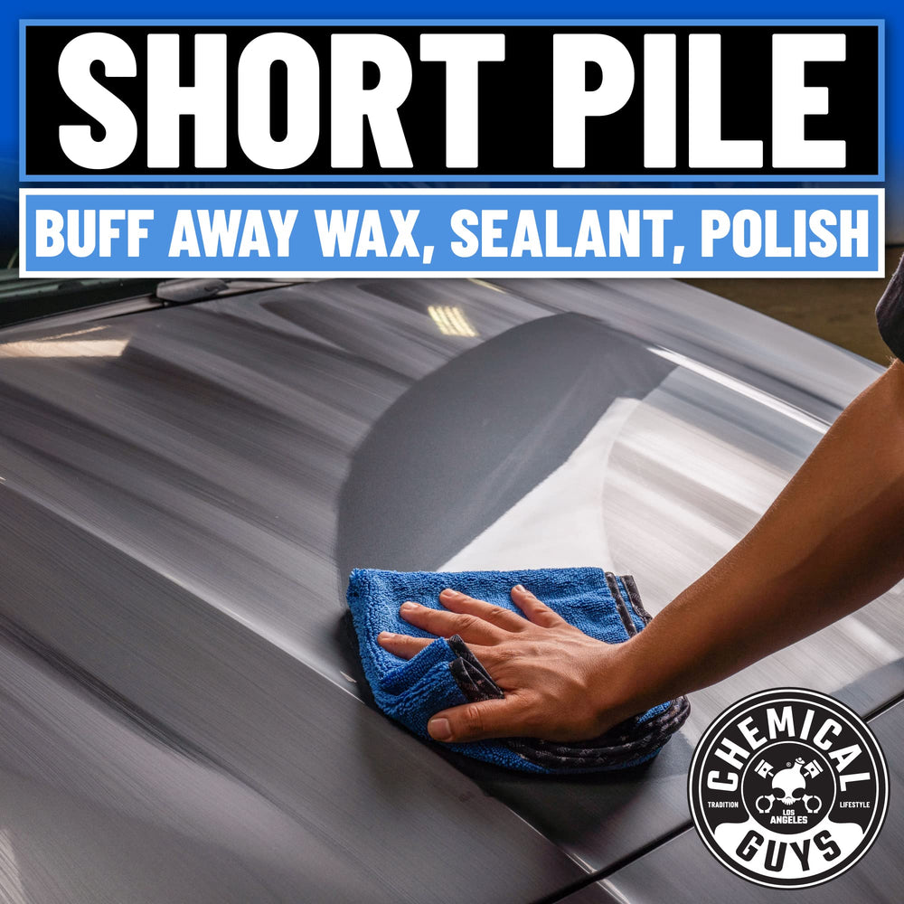Chemical Guys towel cleaning glass with no streaks for improved clarity