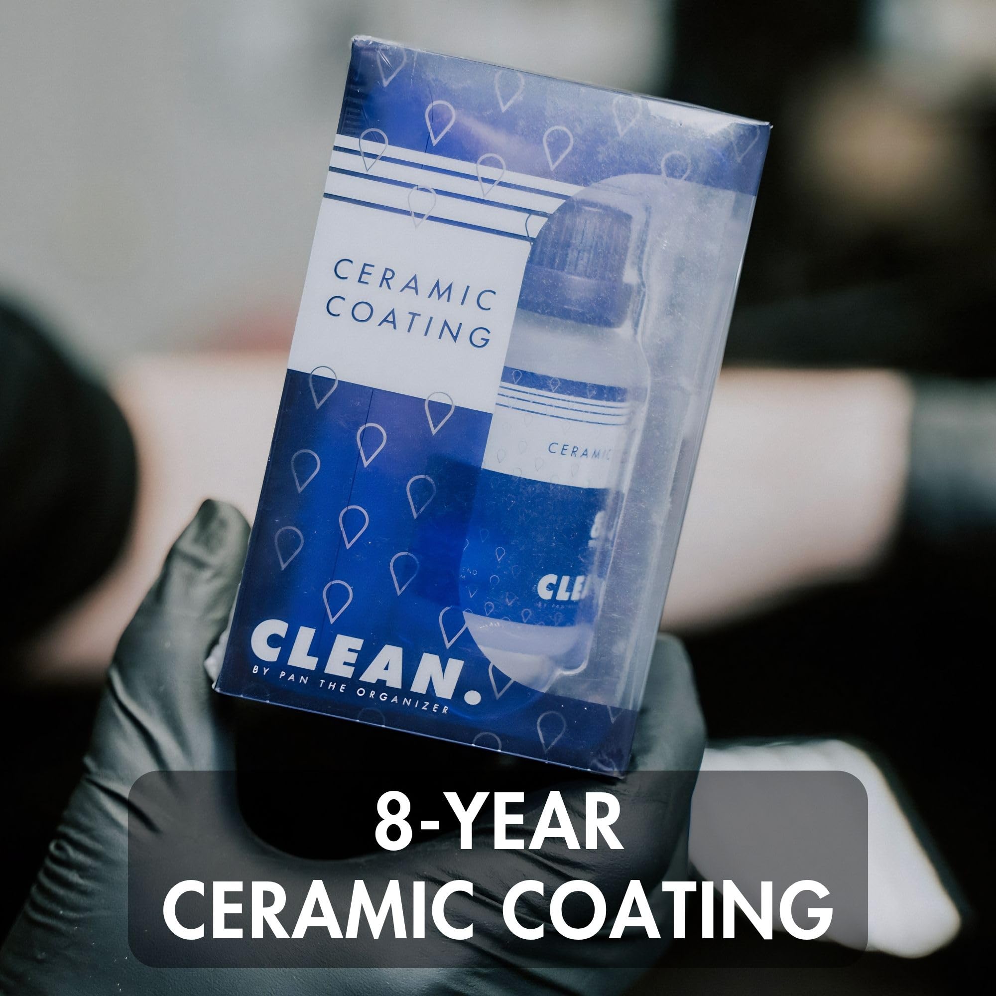 CLEAN. 30ml bottle next to a hand for compact size and multi-vehicle coverage