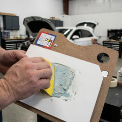 Clean Sheets CS-200 in use mixing epoxy on pad, demonstrating clean mixing and faster workflow