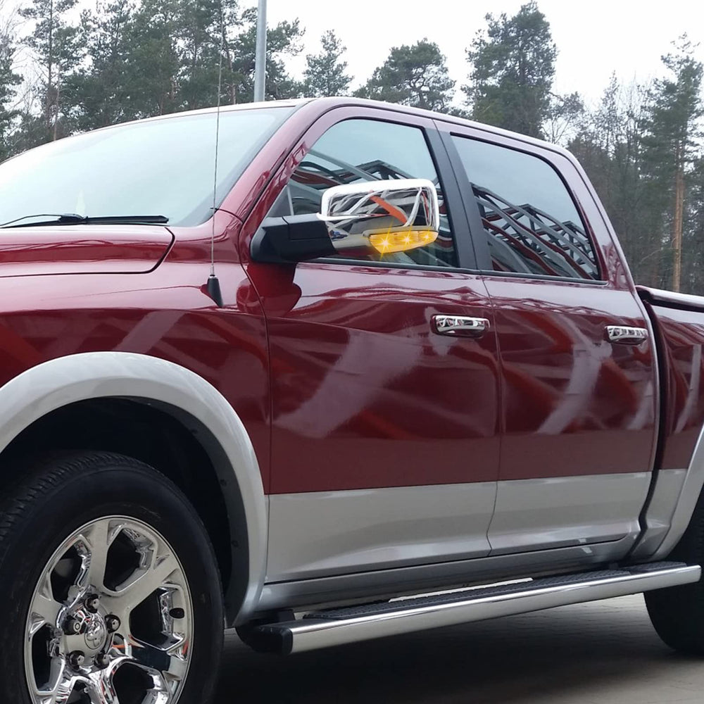 CNYGO mirror light on parked Ram in driveway showing visual upgrade benefit