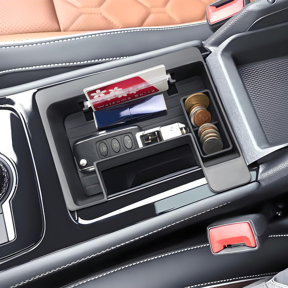 Coleya size comparison with ruler showing precise OEM-fit for Tiguan console