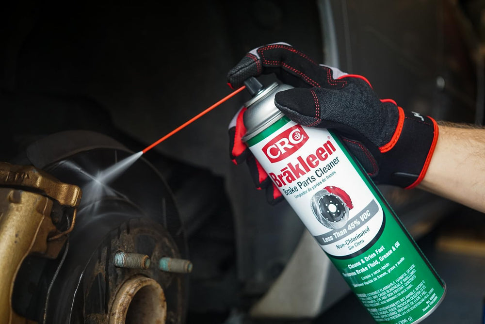 CRC Brakleen held in hand for scale and convenient 14‑ounce size