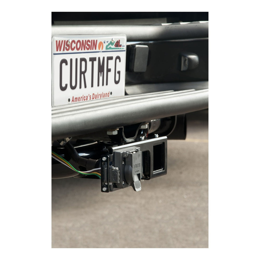 CURT 58000 installed on truck rear showing real-world use and organized trailer hookup