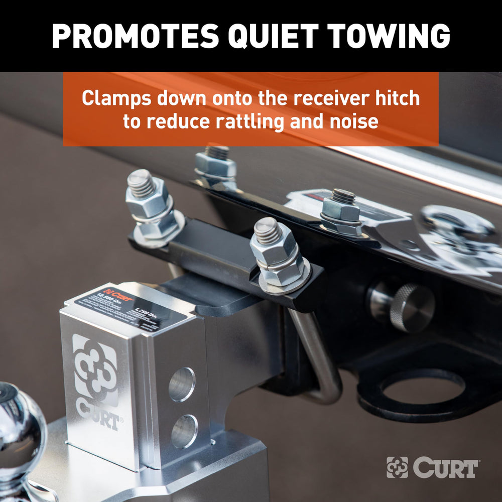 CURT clamp installed on truck receiver in lifestyle setting reducing noise benefit