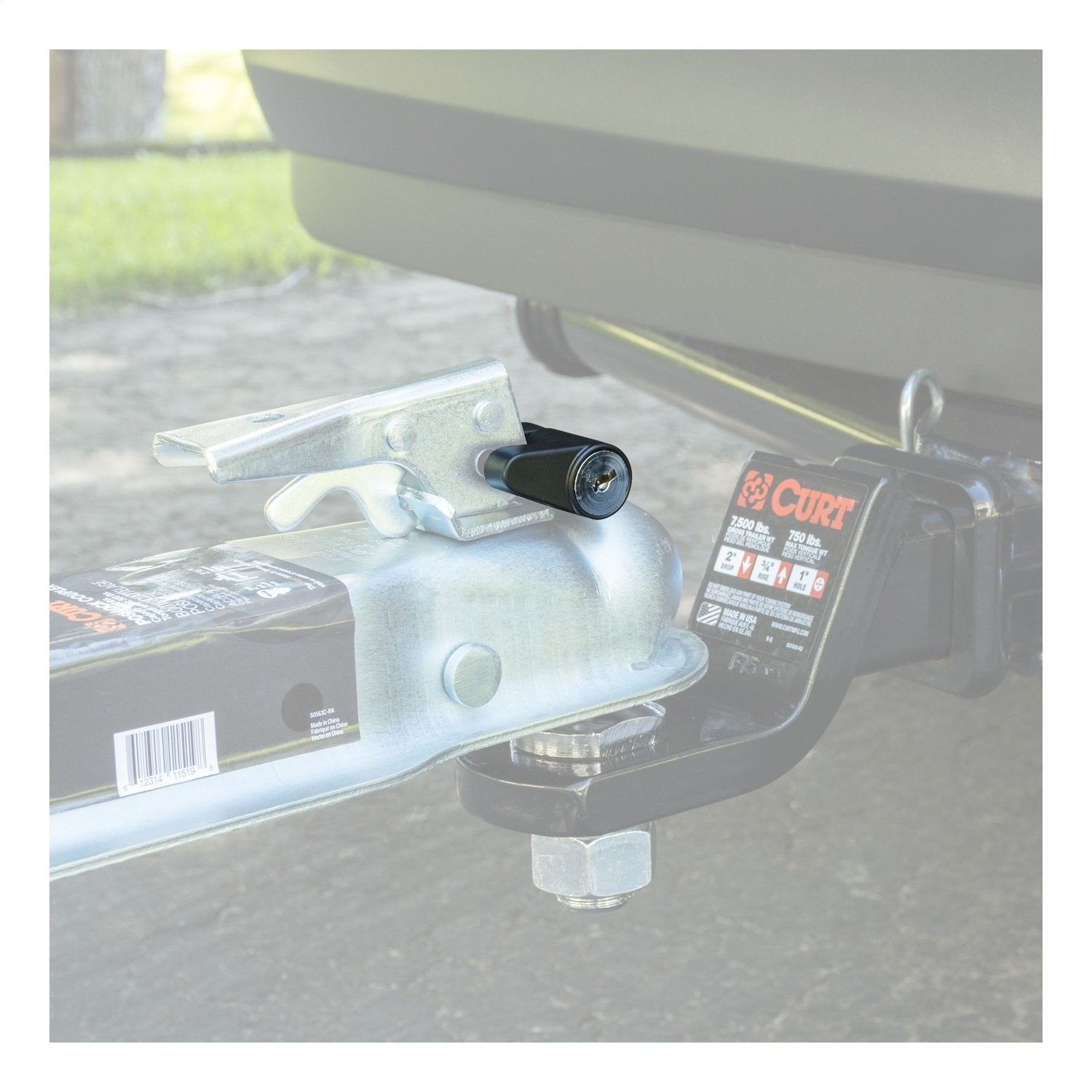 CURT latch engaged with lock showing 3/4-inch span compatibility