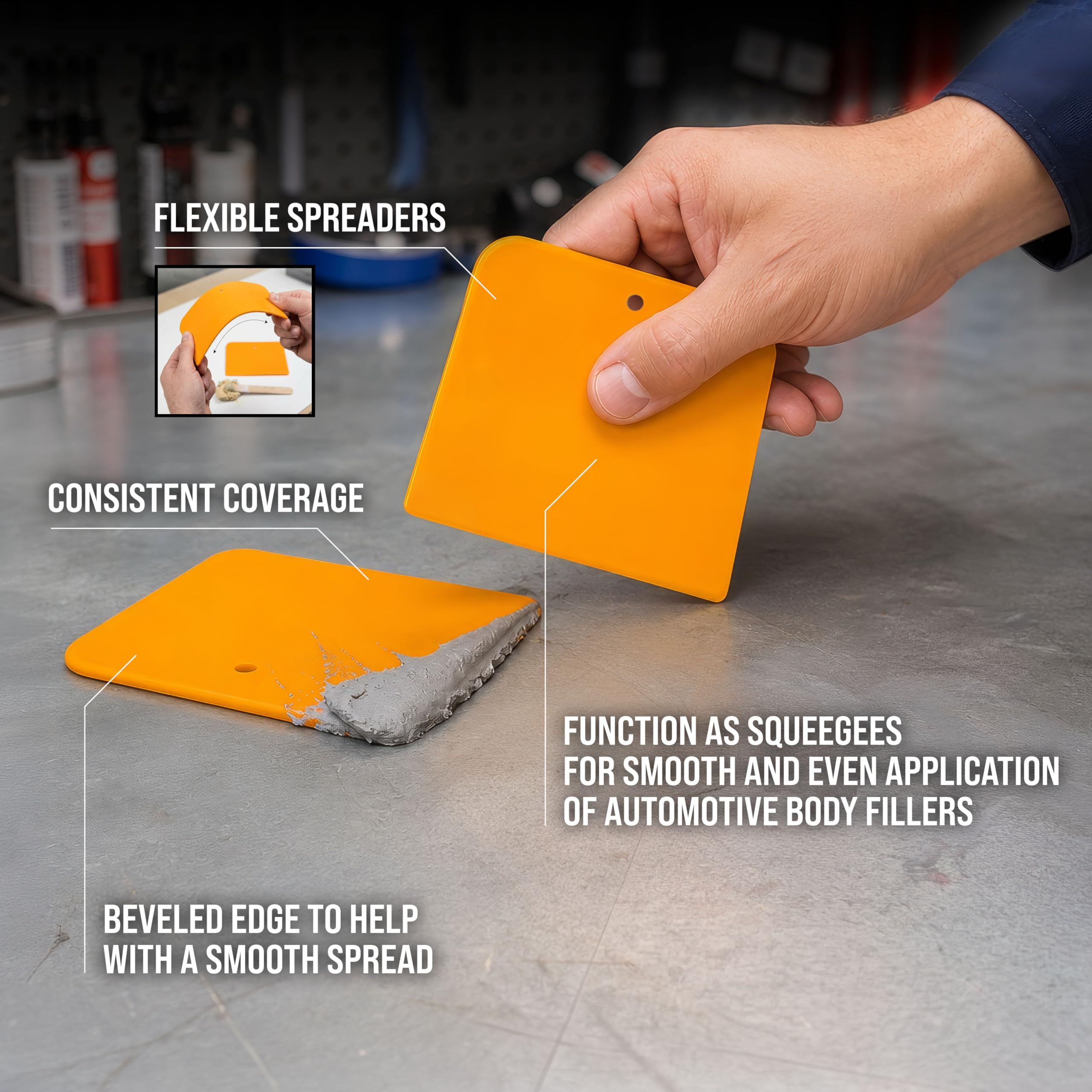 Custom Shop spreaders held in hand to show size and handling benefit