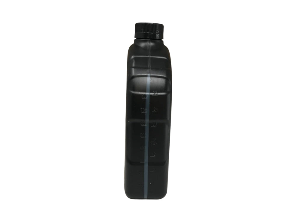 Cyclemax bottle in hand to show scale and ease of handling during maintenance
