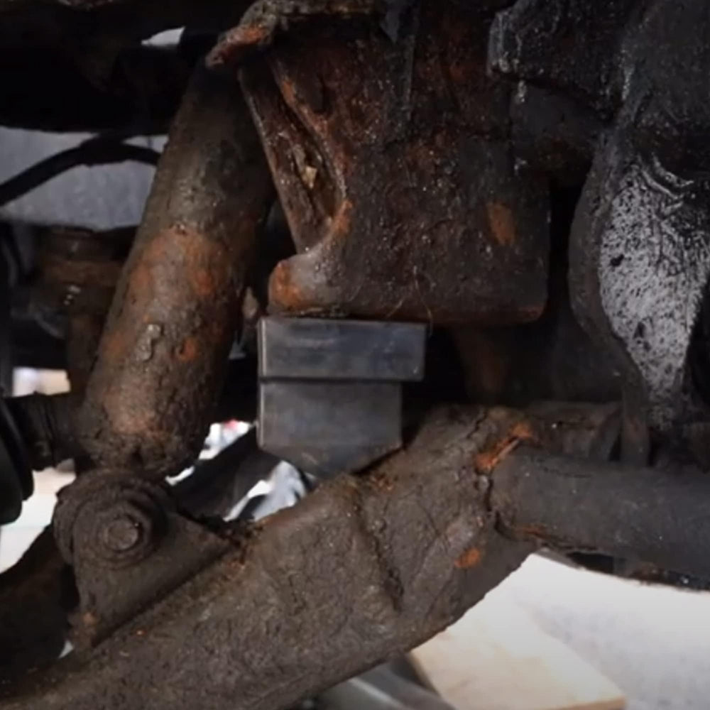 Dasbecan bumper stop installed on control arm demonstrating secure fitment