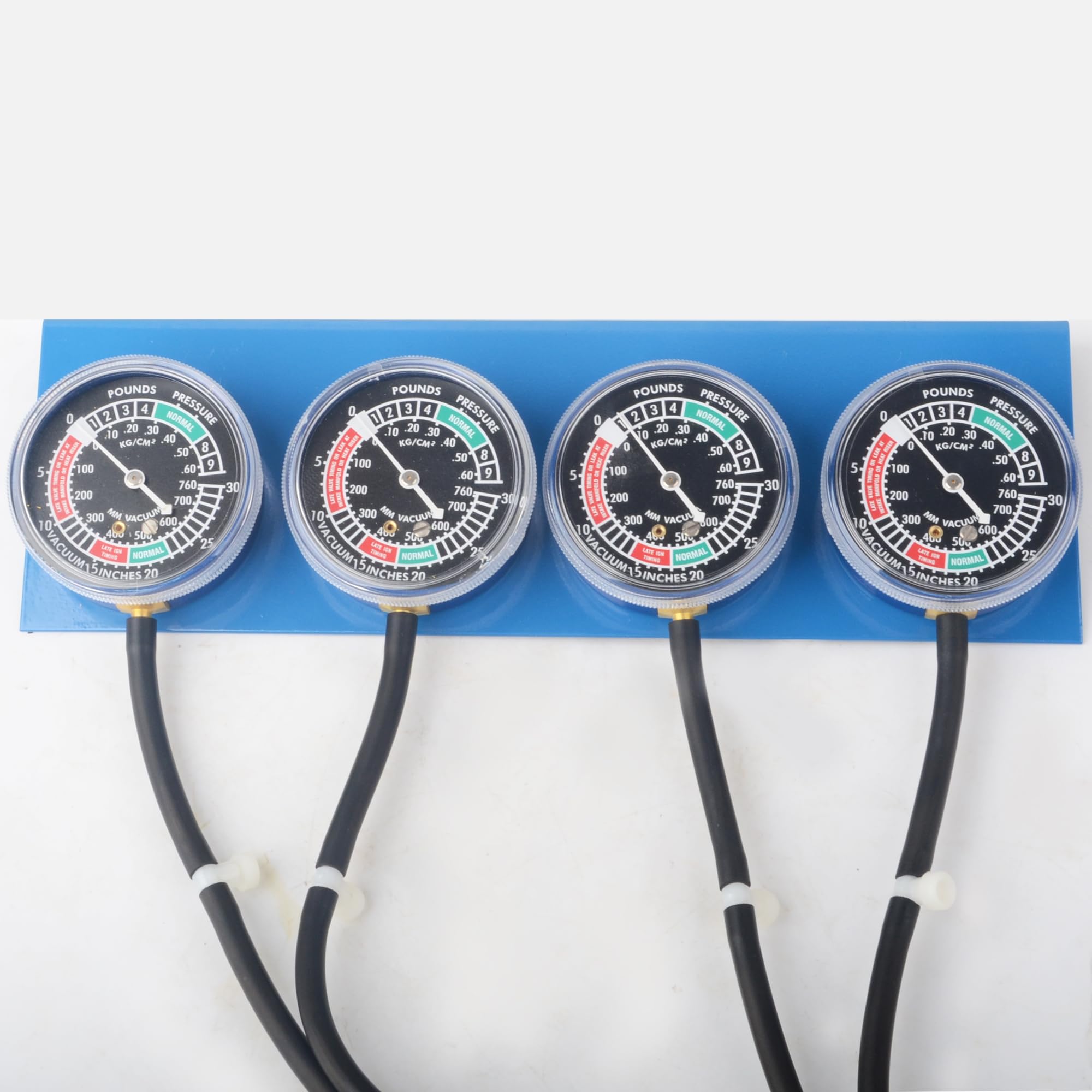 DAYUAN tool connected to a motorcycle engine for accurate carb synchronization