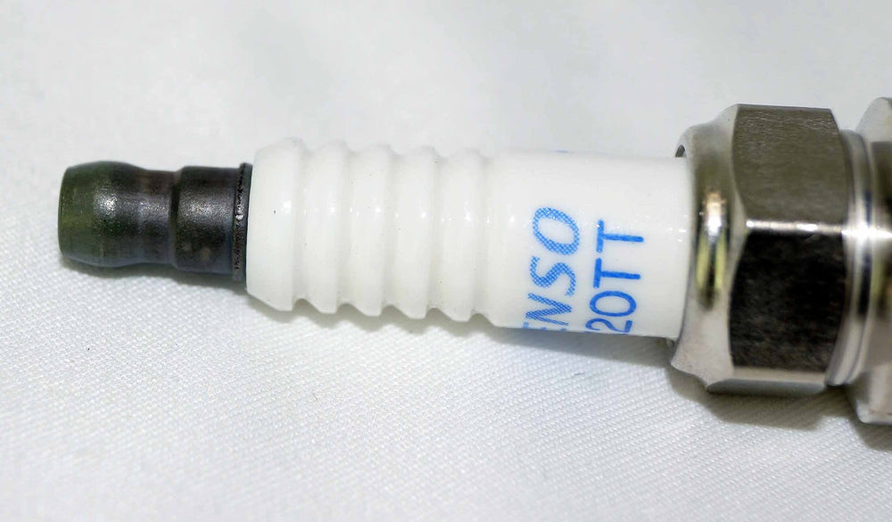 Denso PK20TT installed in an engine illustrating reliable ignition benefit
