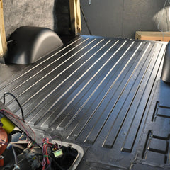 Design Engineering sprayed door panel in progress reducing rattles and noise benefit