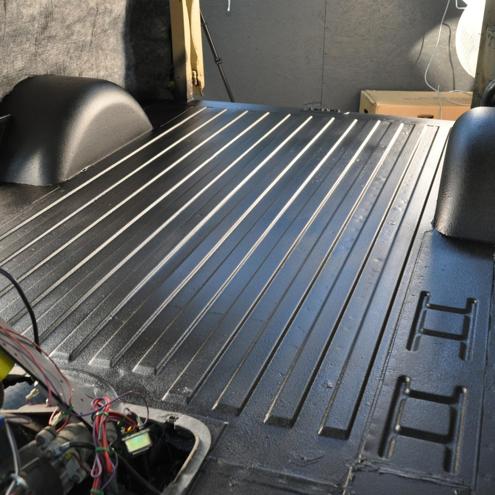 Design Engineering trunk well with even spray coverage, illustrates road-noise protection